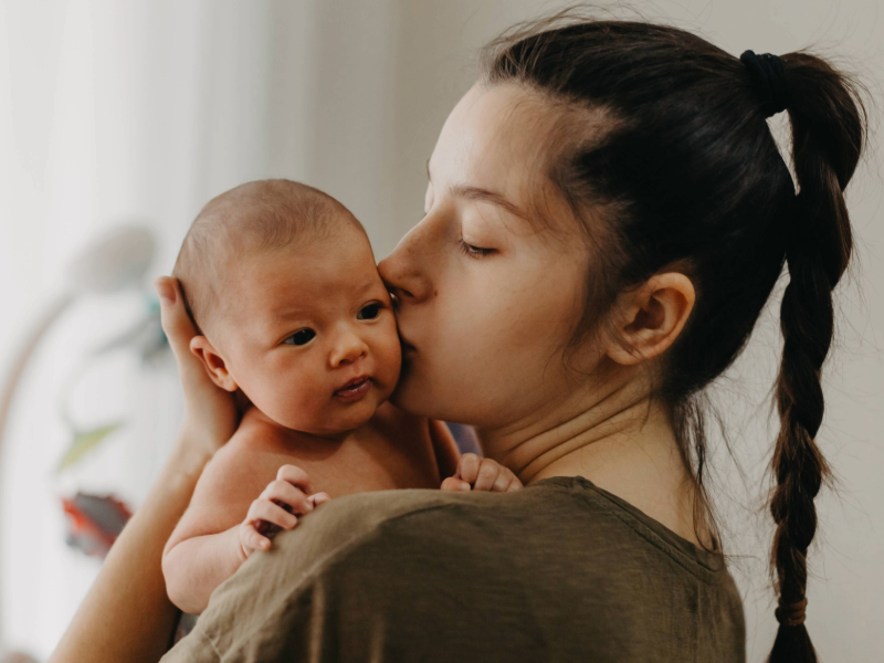 Mother holding her baby